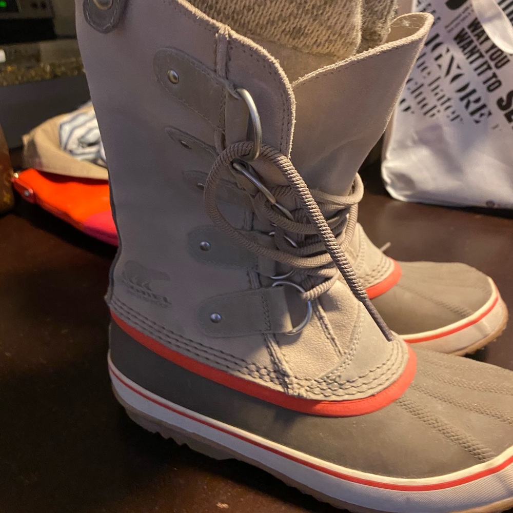 Sorel’s Cream and Orange boots